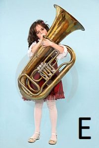 E girl playing tuba